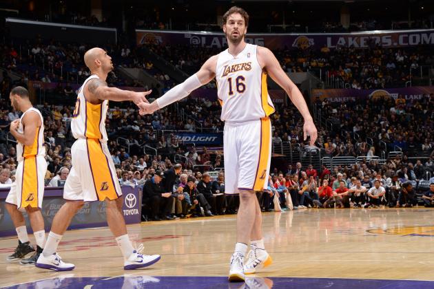 hi-res-460863611-robert-sacre-and-pau-gasol-of-the-los-angeles-lakers_crop_north